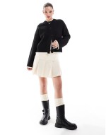 bengaline pleated mini skirt in cream