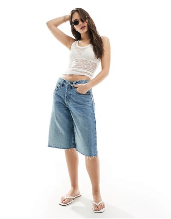peggy low waist baggy denim shorts in mid blue wash