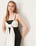extreme contrast bow midaxi dress in black and cream